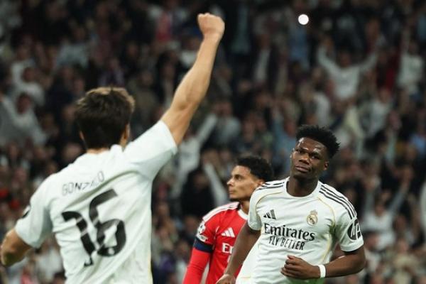 Real Madrid memastikan langkah ke babak 16 besar Liga Champions setelah menaklukkan SL Benfica dengan skor 2-1 pada leg kedua.